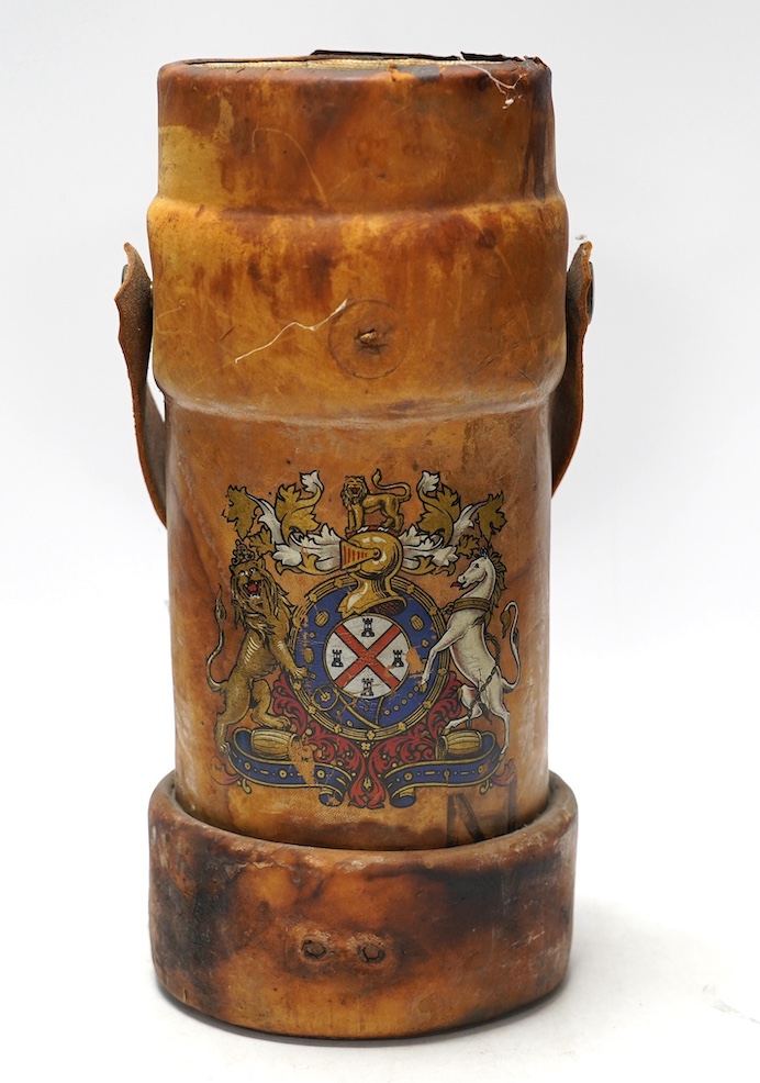 A leather powder flask, with painted Royal crest, 33cm high. Condition - poor to fair, some staining to the leather and wear at the edges